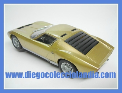 LAMBORGHINI MIURA SV (GOLD ) CON LUCES DE AUTO ART SLOT RACING REF/ 13112 . TODOS LOS COCHES DE SLOT DE LA WEB, SON COMPATIBLES CON CIRCUITOS SCALEXTRIC, SUPERSLOT, NINCO Y CARRERA.