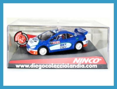 PEUGEOT 307 WRC " OMV " DE NINCO REF/ 50412 .TODOS LOS COCHES DE SLOT DE LA WEB, SON COMPATIBLES CON CIRCUITOS SCALEXTRIC, SUPERSLOT, NINCO Y CARRERA......... www.diegocolecciolandia.com . Tienda Scalextric Slot Madrid España . Slot Cars Shop Madrid Spain .
