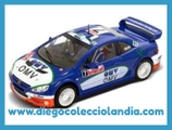 PEUGEOT 307 WRC " OMV " DE NINCO REF/ 50412 .TODOS LOS COCHES DE SLOT DE LA WEB, SON COMPATIBLES CON CIRCUITOS SCALEXTRIC, SUPERSLOT, NINCO Y CARRERA......... WWW.DIEGOCOLECCIOLANDIA.COM . TIENDA SCALEXTRIC SLOT MADRID ESPAÑA . SLOT CARS SHOP MADRID SPAIN .