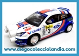FORD FOCUS WRC " MONTECARLO 2001 /CARLOS SAINZ " DE SCALEXTRIC / ALTAYA. COCHE NUEVO A ESTRENAR SIN CAJA . ( LOS COCHES DE SCALEXTRIC / PLANETA Y ALTAYA, NO SE VENDIERON, EN SU MOMENTO, CON CAJA ) . TODOS LOS COCHES DE LA WEB, SON COMPATIBLES CON CIRCUITOS SCALEXTRIC, NINCO, SUPERSLOT Y CARRERA. WWW.DIEGOCOLECCIOLANDIA.COM . TIENDA SCALEXTRIC MADRID ESPAÑA . 
