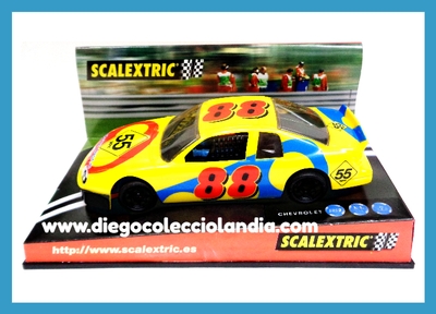 CHEVROLET NASCAR " 55 MPH " DE SCALEXTRIC REF/ 6030 . SERIE SRS-2 . COMERCIALIZADO POR SCALEXTRIC EN 1999 .TODOS LOS COCHES DE LA WEB, SON COMPATIBLES CON CIRCUITOS SCALEXTRIC, SUPERSLOT, NINCO Y CARRERA.. www.diegocolecciolandia.com . Tienda Scalextric Slot Madrid España . Slot Cars Shop Madrid Spain . RECORTADO CÓDIGO DE BARRAS DEL CARTÓN POSTERIOR .