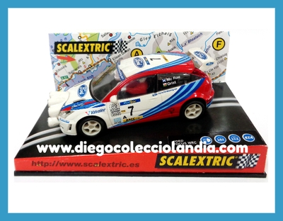 FORD FOCUS WRC #7 " MONTECARLO 99 / Mc RAE " DE SCALEXTRIC REF/ 6026 . TODOS LOS COCHES DE LA WEB, SON COMPATIBLES CON CIRCUITOS SCALEXTRIC, SUPERSLOT, NINCO Y CARRERA... www.diegocolecciolandia.com . Tienda Scalextric Madrid España . Slot Cars Shop Madrid Spain .