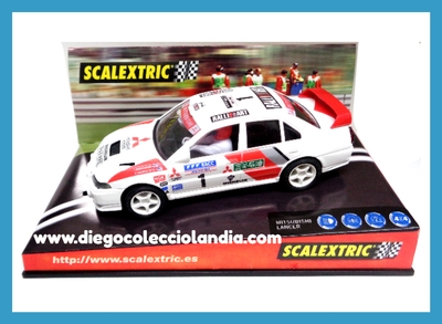 MITSUBISHI LANCER " COSTA BRAVA  " DE SCALEXTRIC REF / 6000 . TODOS LOS COCHES DE LA WEB, SON COMPATIBLES CON CIRCUITOS SCALEXTRIC, SUPERSLOT, NINCO Y CARRERA...  www.diegocolecciolandia.com  . Tienda Scalextric Madrid. Tienda Slot Madrid . Tienda Scalextric España . Tienda Slot España .