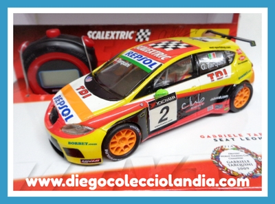 SEAT LEÓN TDI " GABRIELE TARQUINI / CAMPEÓN WTCC 2009 " DE SCALEXTRIC REF/ 6479 . INCLUYE CRONÓMETRO DEPORTIVO . TODOS LOS COCHES DE LA WEB, SON COMPATIBLES CON CIRCUITOS SCALEXTRIC, SUPERSLOT, NINCO Y CARRERA.... www.diegocolecciolandia.com .  Tienda Scalextric Madrid España. Slot Cars Shop Madrid Spain . Scalextric Store Spain .