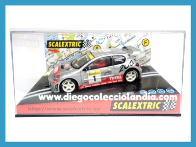PEUGEOT 206 WRC #1 " MONTE CARLO 2001 " DE SCALEXTRIC REF/ 6068 . TODOS LOS COCHES DE LA WEB, SON COMPATIBLES CON CIRCUITOS SCALEXTRIC, SUPERSLOT, NINCO Y CARRERA... www.diegocolecciolandia.com . Tienda Scalextric Slot Madrid España . Slot Cars Shop Madrid Spain .