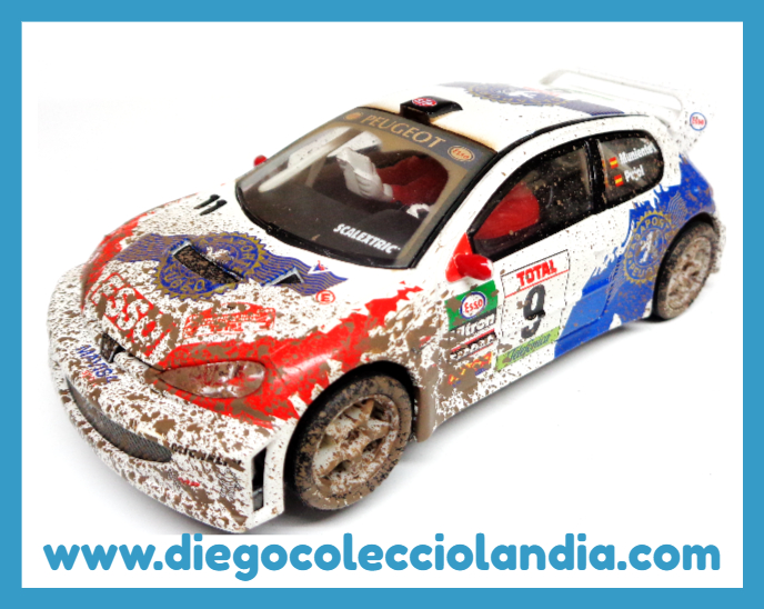 PEUGEOT 206 WRC " EFECTO BARRO " DE SCALEXTRIC REF/ 6051 . TODOS LOS COCHES DE LA WEB, SON COMPATIBLES CON CIRCUITOS SCALEXTRIC, SUPERSLOT, NINCO Y CARRERA....... www.diegocolecciolandia.com . Slot Cars Shop Madrid Spain . Tienda Scalexric Madrid España .