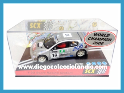 PEUGEOT 206 WRC " WORLD CHAMPION 2000 - GRONHOLM " DE SCALEXTRIC REF / 6064 . TODOS LOS COCHES DE SLOT DE LA WEB, SON COMPATIBLES CON CIRCUITOS SCALEXTRIC, SUPERSLOT, NINCO Y CARRERA............ www.diegocolecciolandia.com . Tienda Slot, Scalextric Madrid, España. Slot Cars Shop Spain.