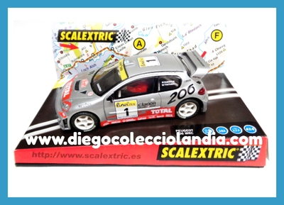 PEUGEOT 206 WRC " MONTECARLO 2001 " DE SCALEXTRIC REF / 6068-US  . COCHE USADO, EN PERFECTO ESTADO, IMPECABLE Y CON SU CAJA ORIGINAL . TODOS LOS COCHES DE SLOT DE LA WEB, SON COMPATIBLES CON CIRCUITOS SCALEXTRIC, SUPERSLOT, NINCO Y CARRERA.... www.diegocolecciolandia.com . Tienda scalextric Slot Madrid España . Slot Cars Shop Madrid Spain .