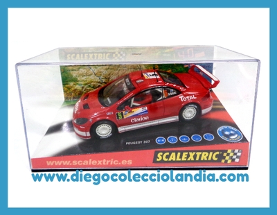 PEUGEOT 307 WRC #5 " GRÖNHOLM " DE SCALEXTRIC REF/ 6161 . TODOS LOS COCHES DE LA WEB, SON COMPATIBLES CON CIRCUITOS SCALEXTRIC, SUPERSLOT, NINCO Y CARRERA..... www.diegocolecciolandia.com . Tienda Scalextric Madrid España . Slot Cars Shop Madrid Spain .