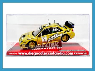 SUBARU IMPREZA WRC #7 " Mc RAE " DE SCALEXTRIC REF / A10050S300 . TODOS LOS COCHES DE LA WEB, SON COMPATIBLES CON CIRCUITOS SCALEXTRIC, SUPERSLOT, NINCO Y CARRERA.... www.diegocolecciolandia.com .  Tienda Scalextric Madrid España . Slot Cars Shop Madrid Spain .