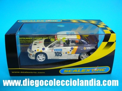 Mitsubishi Lancer Evolution VII WRC #105 . Scalextric UK . Ref/ C2588.
TODOS LOS COCHES DE LA WEB, SON COMPATIBLES CON CIRCUITOS SCALEXTRIC, NINCO, SUPERSLOT Y CARRERA.........  www.diegocolecciolandia.com  . Tienda Slot, Scalextric Madrid, españa. Slot Cars Shop Spain .